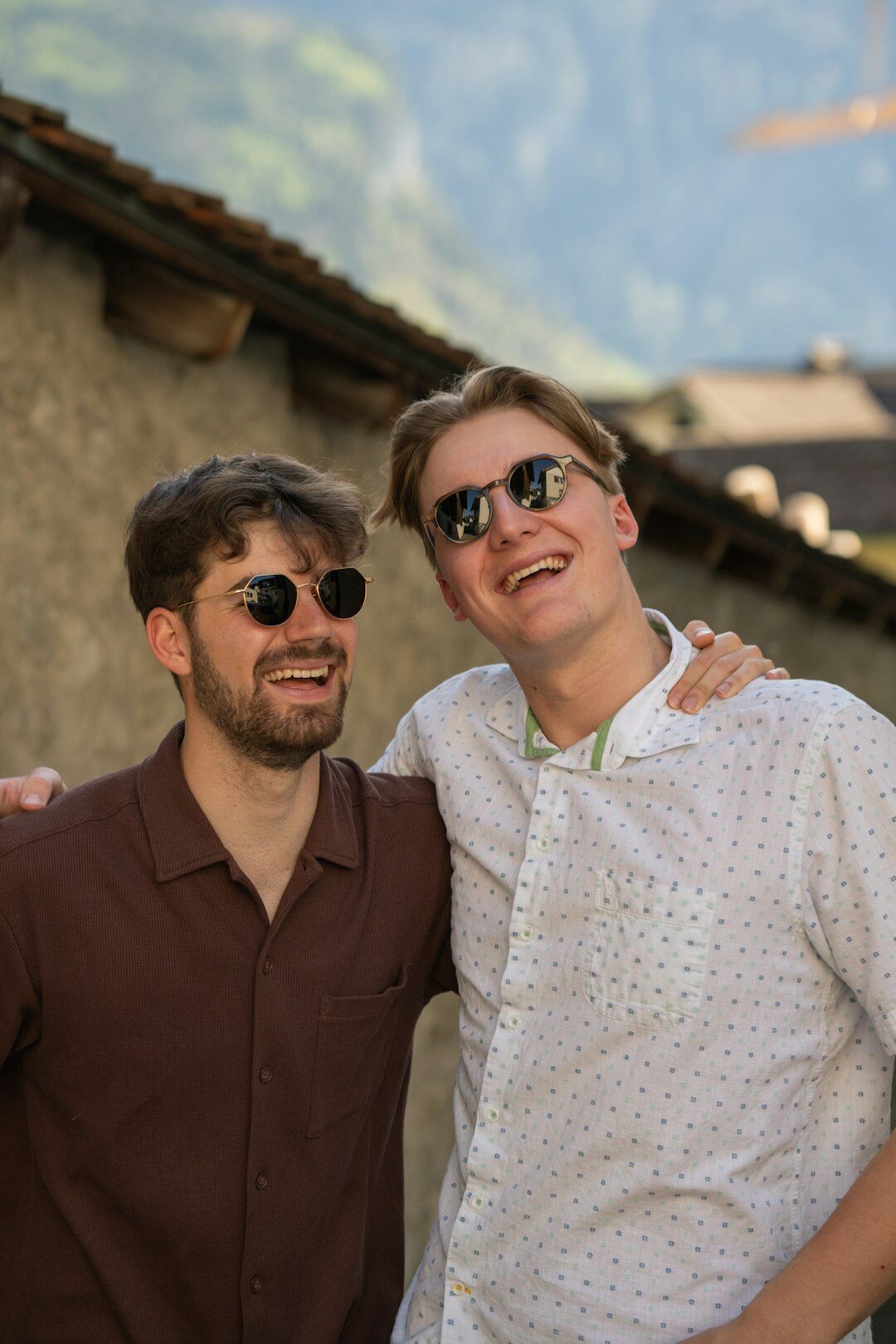 Studio portrait of a Swiss man in his mid-forties wearing glasses, financial reporter