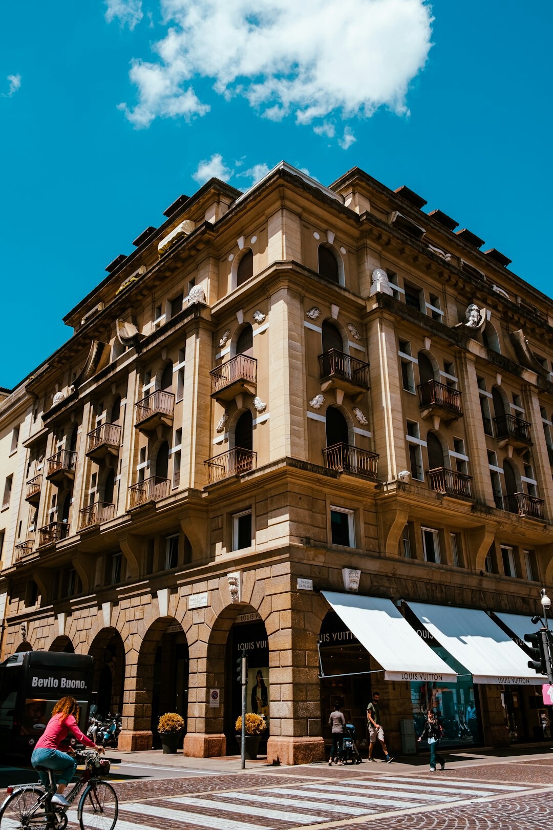 Facade of a Swiss bank building with glass entrance in a city centre