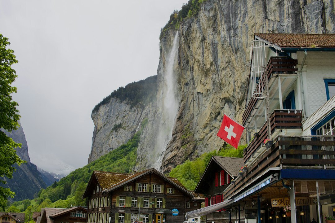 swiss flag on mountain